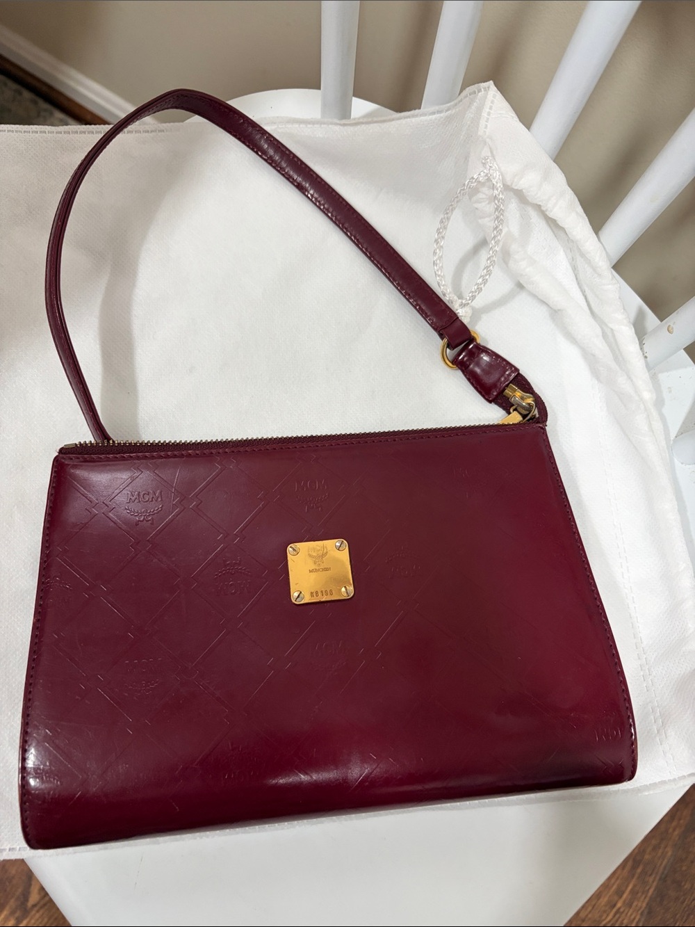 MCM Wine Burgundy maroon hard shell leather pochette